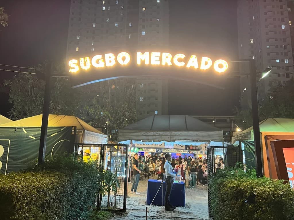 Sugbo Mercado night market entrance with lit marquee